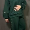 Trainingsanzug mit Perlendetails Damenmode Goldbuegel